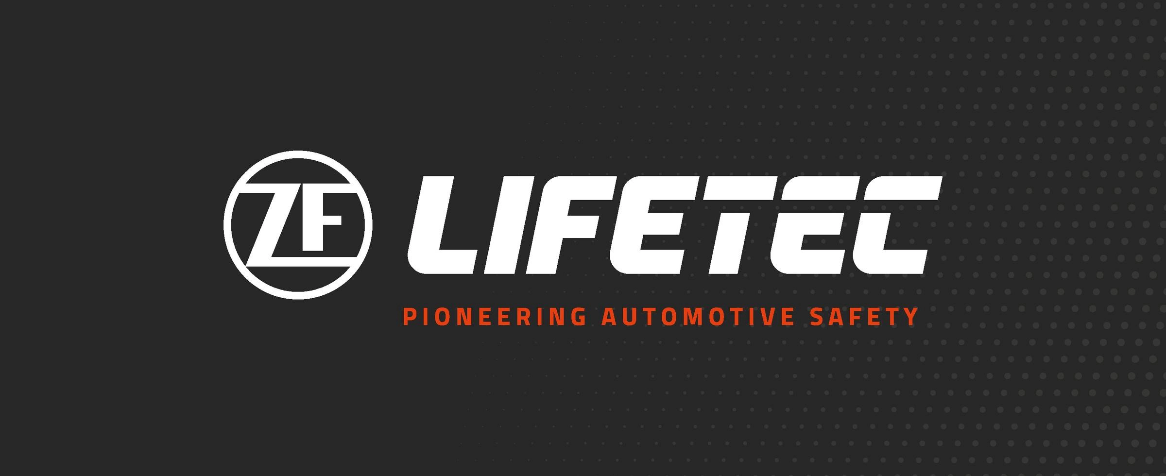 "ZF Lifetech logo with slogan 'Pioneering Automotive Safety' on a dark background"